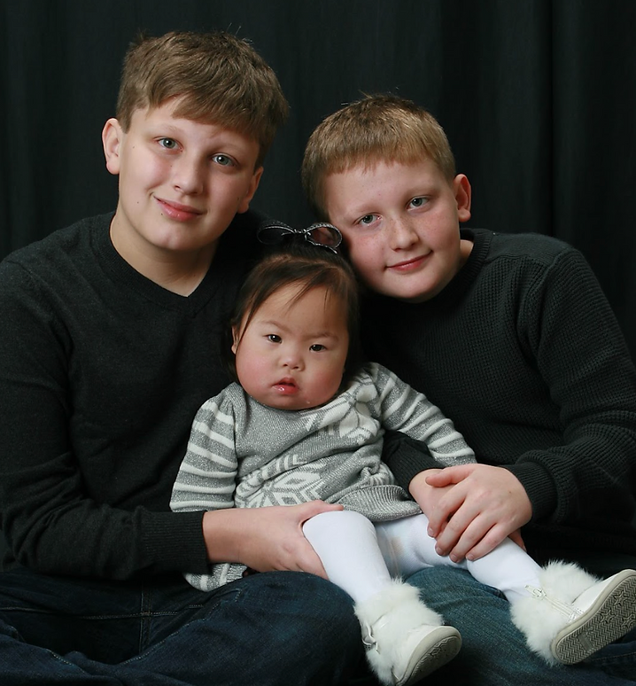 Melanie and her brothers, one of whom became the 2022 Youth Caregiver of the Year.