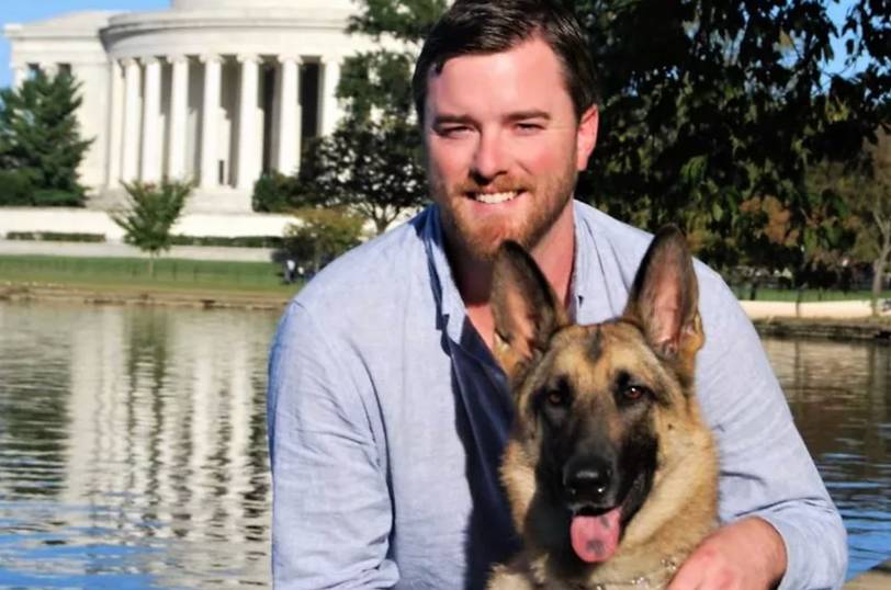 Cole Lyle with his service dog, Kaya.